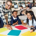 A teacher is with his students running morning meeting with beautiful activities.